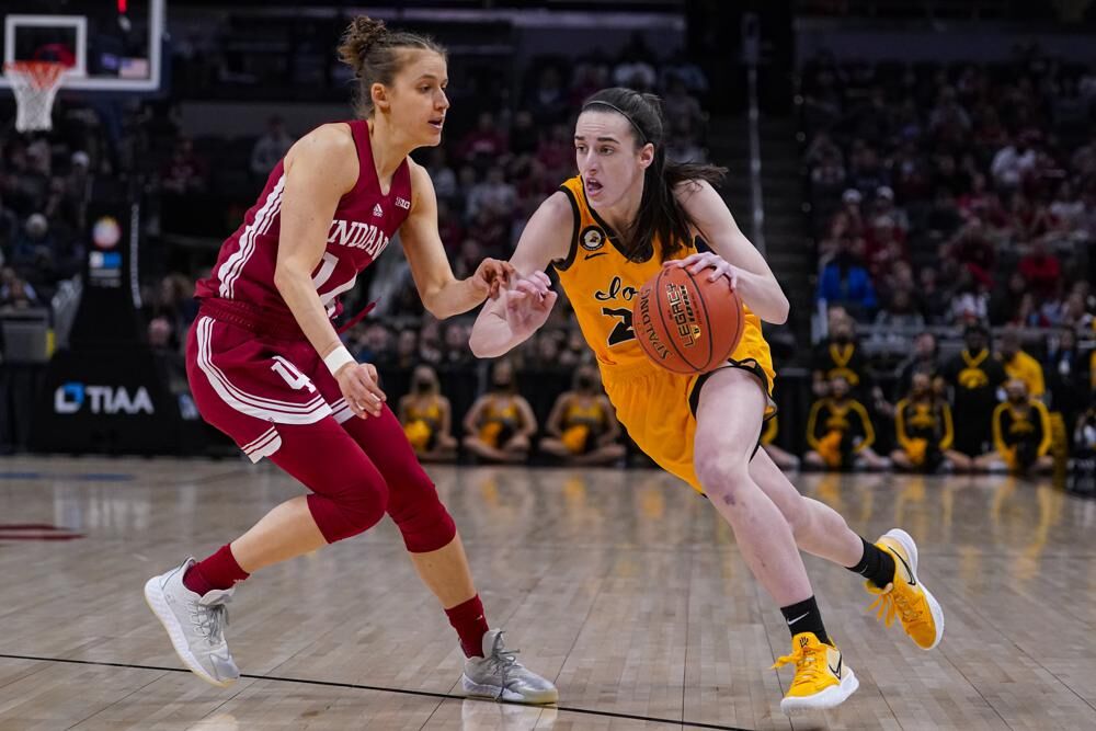 No. 12 Iowa beats No. 14 Indiana for Big Ten title, NCAA bid